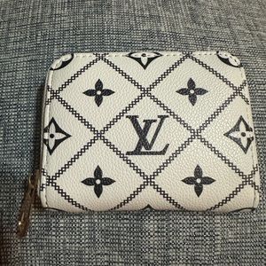 Black and white LV small wallet.